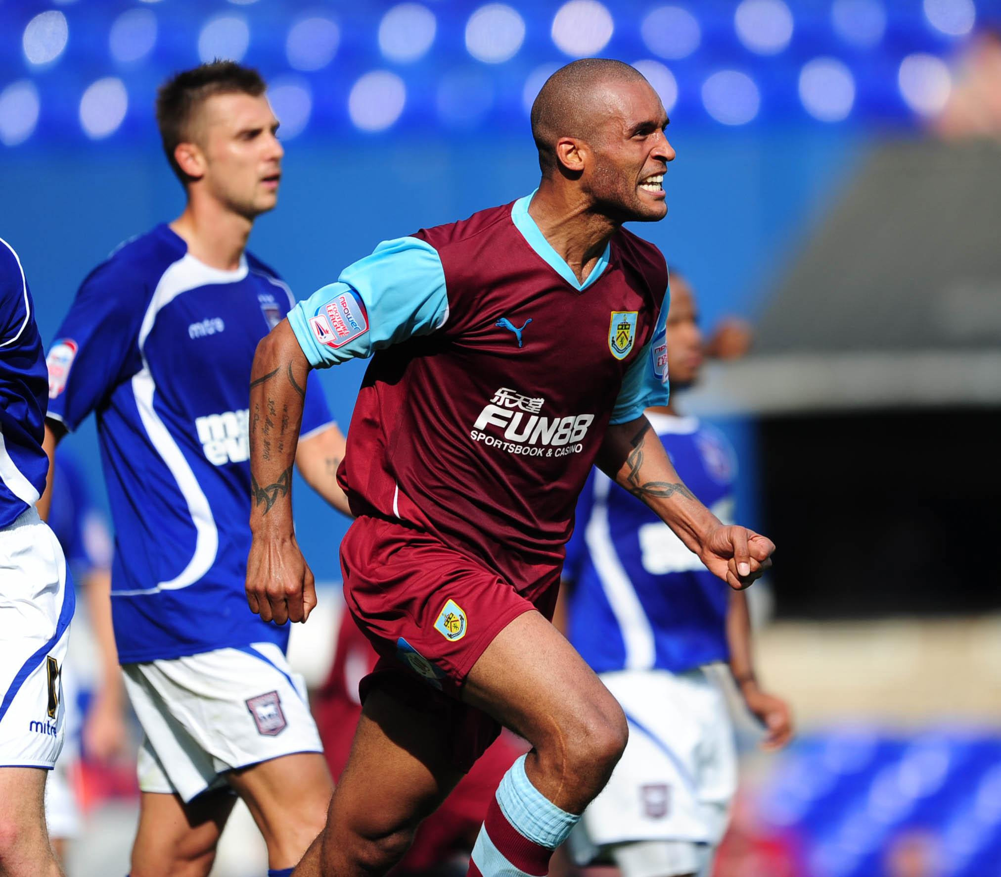 Clarke Carlisle in action for Burnley