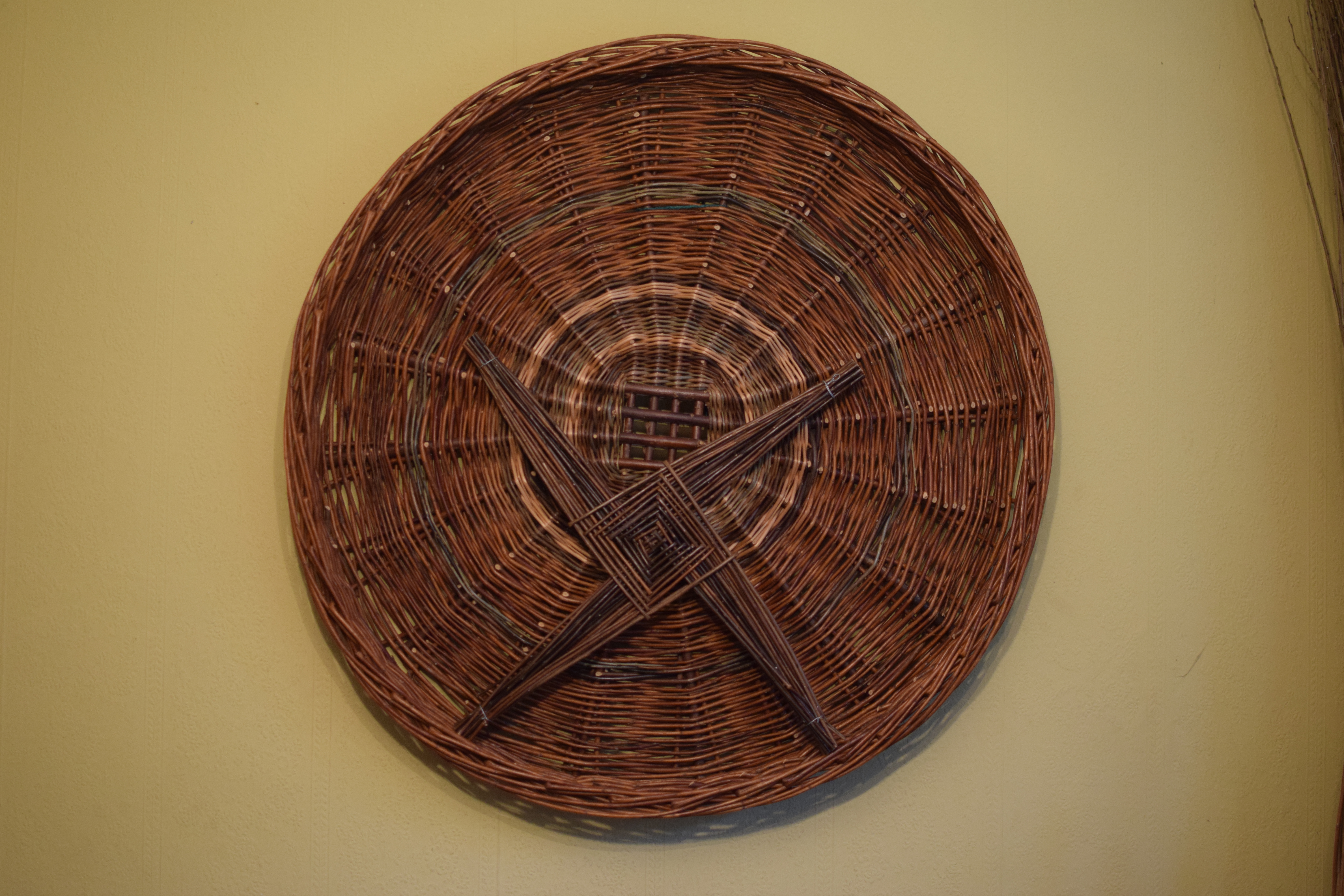 A weaved basket, viewed from above