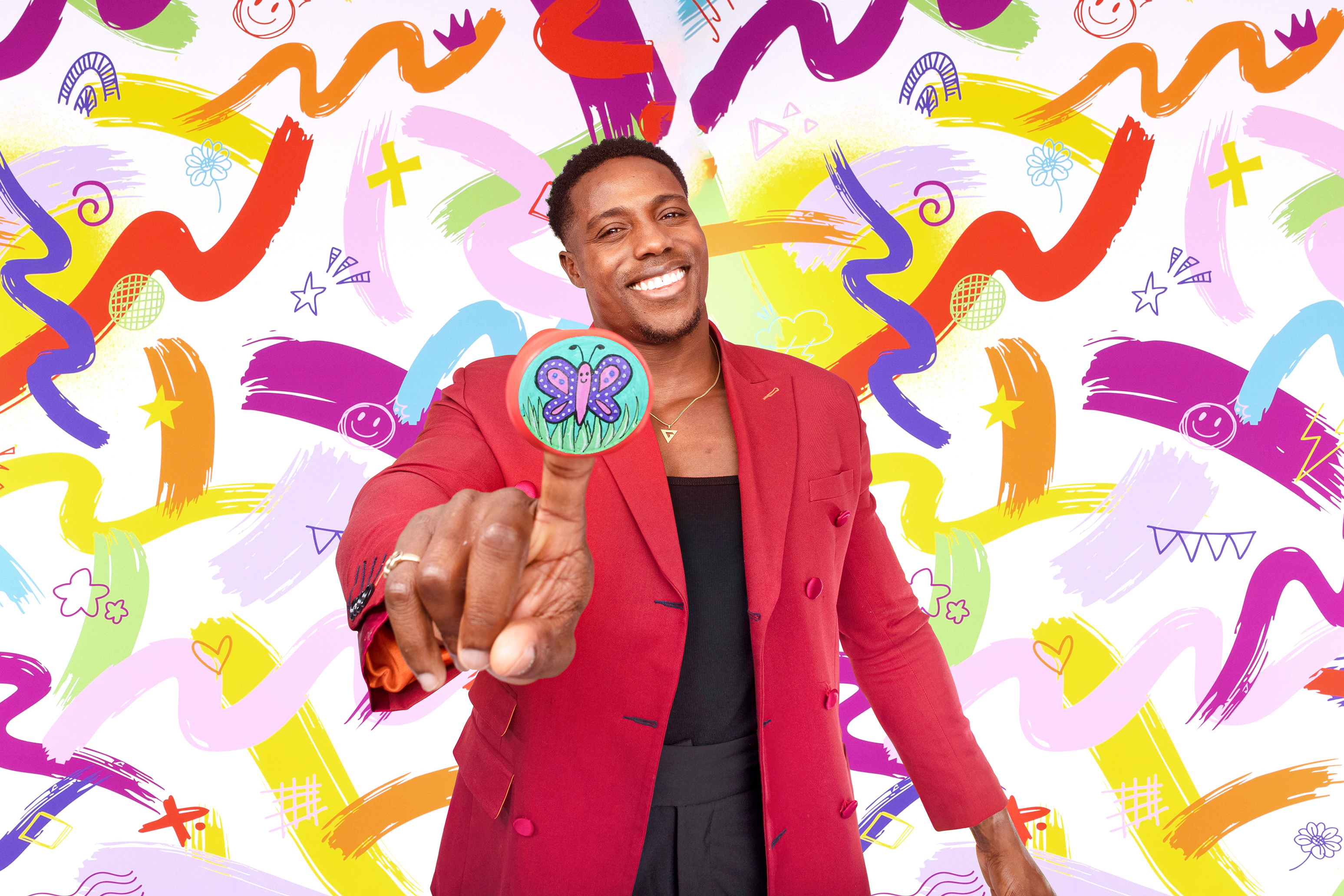 Television personality Harry Aikines-Aryeetey supports Red Nose Day 2026 by wearing one of the new Design-Yer Noses