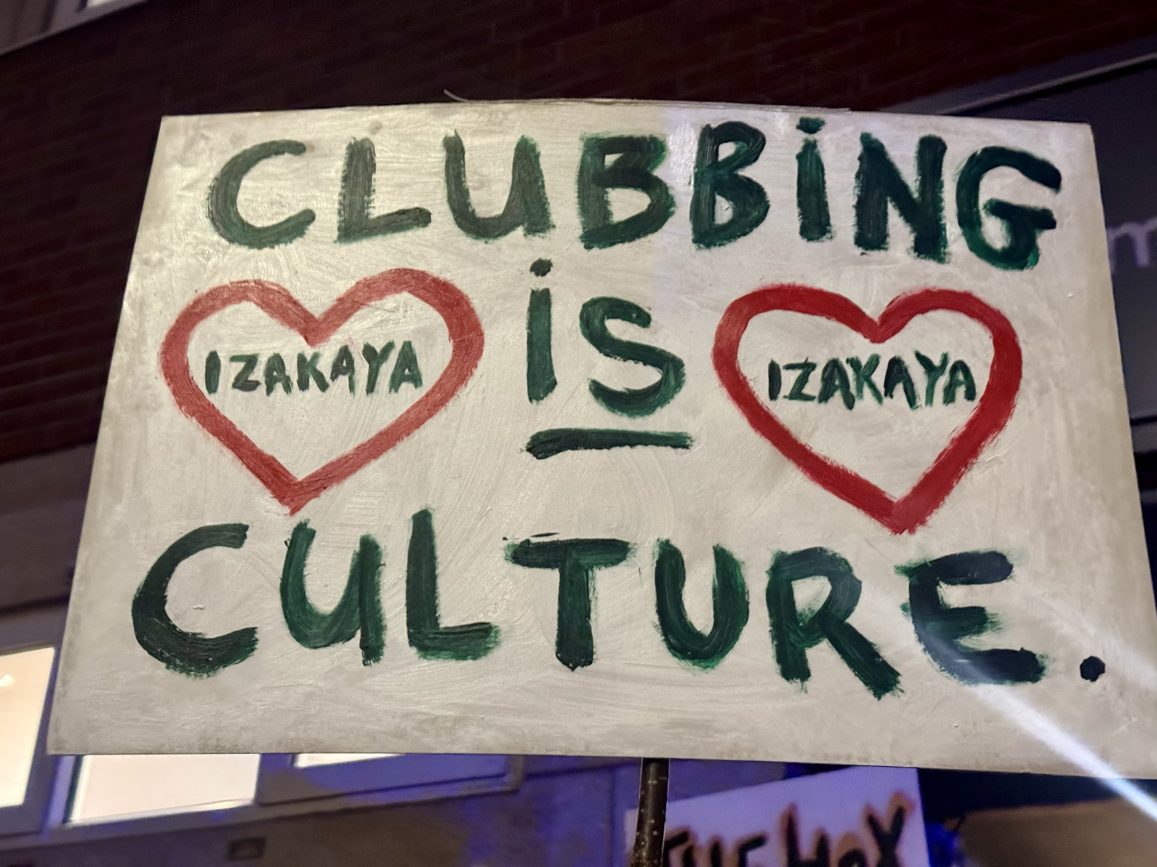 A sign reading Clubbing is Culture
