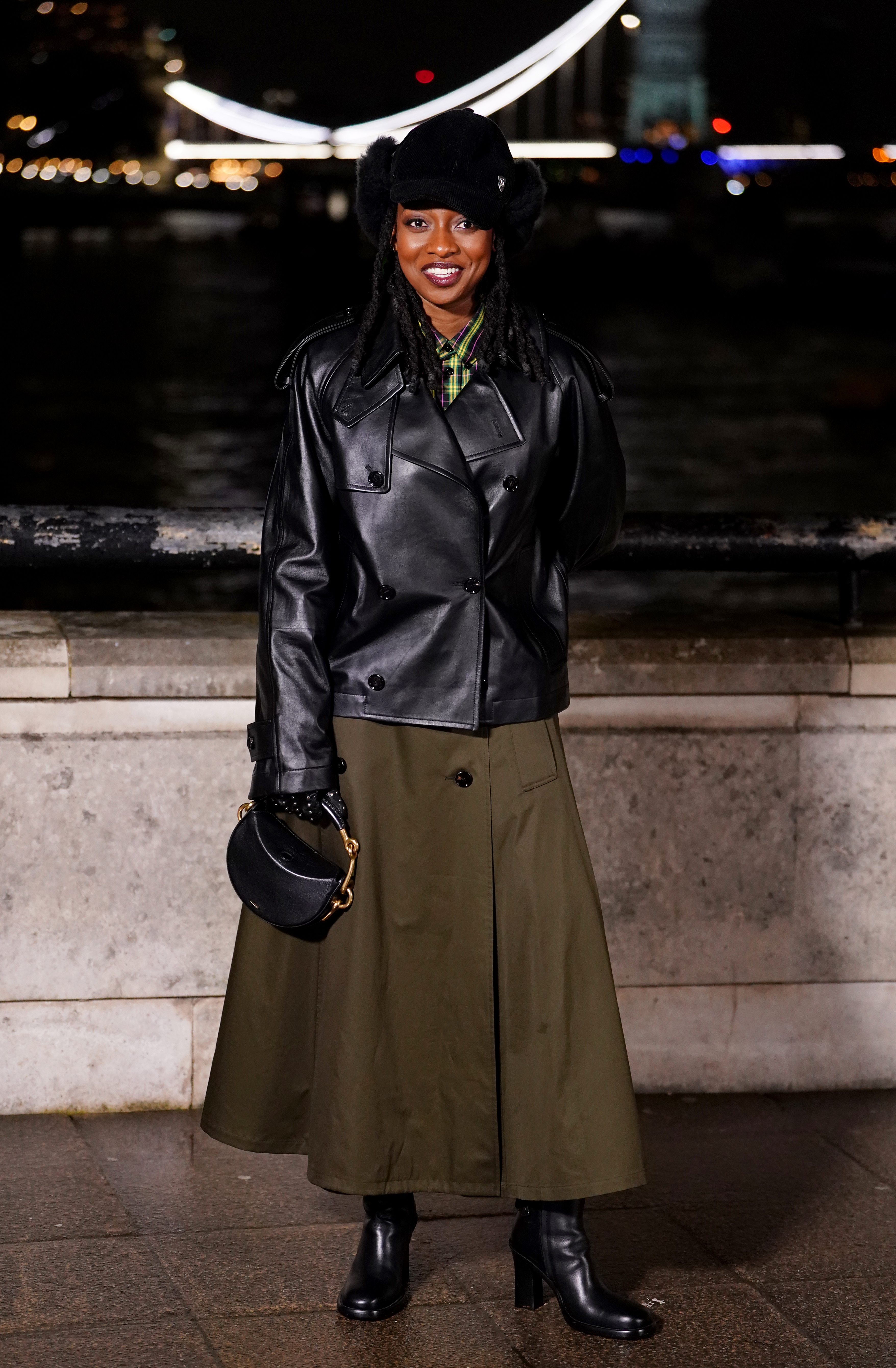 Little Simz attends the Burberry show at 1 Old Billingsgate Walk, London, during London Fashion Week. Picture date: Monday February 23, 2026.