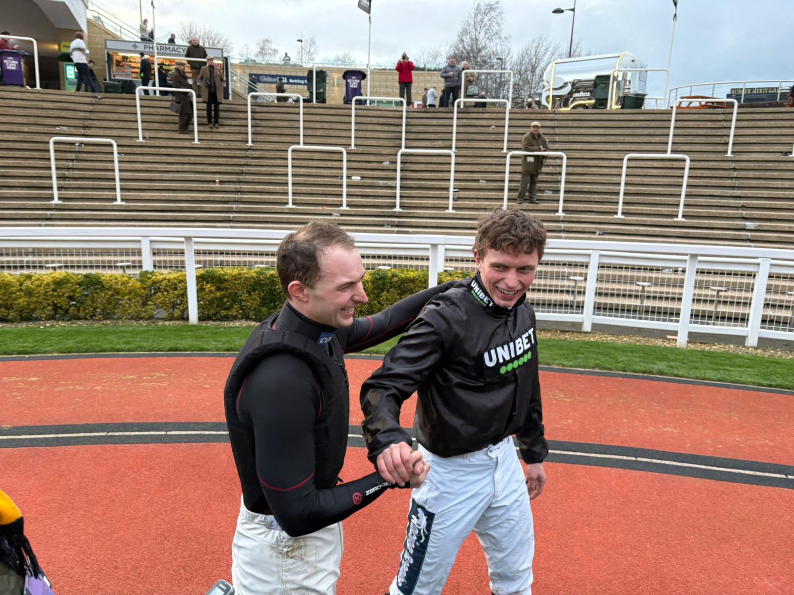 Sean Bowen (left) congratulates younger brother James on riding his first Cheltenham Festival winner, Holloway Queen