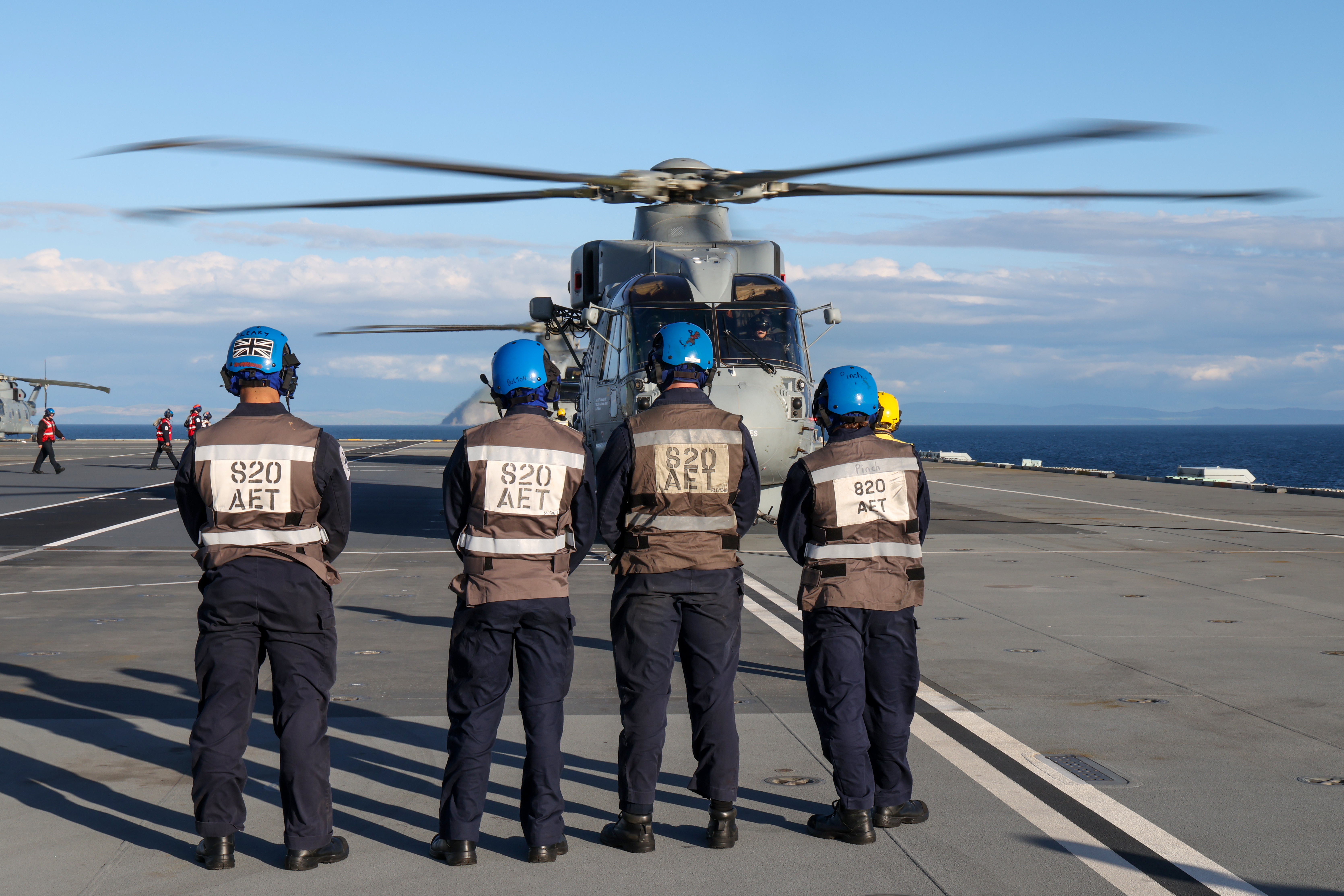 Merlin MK2 helicopters from 814 and 820 Naval Air Squadron embark on HMS Prince of Wales