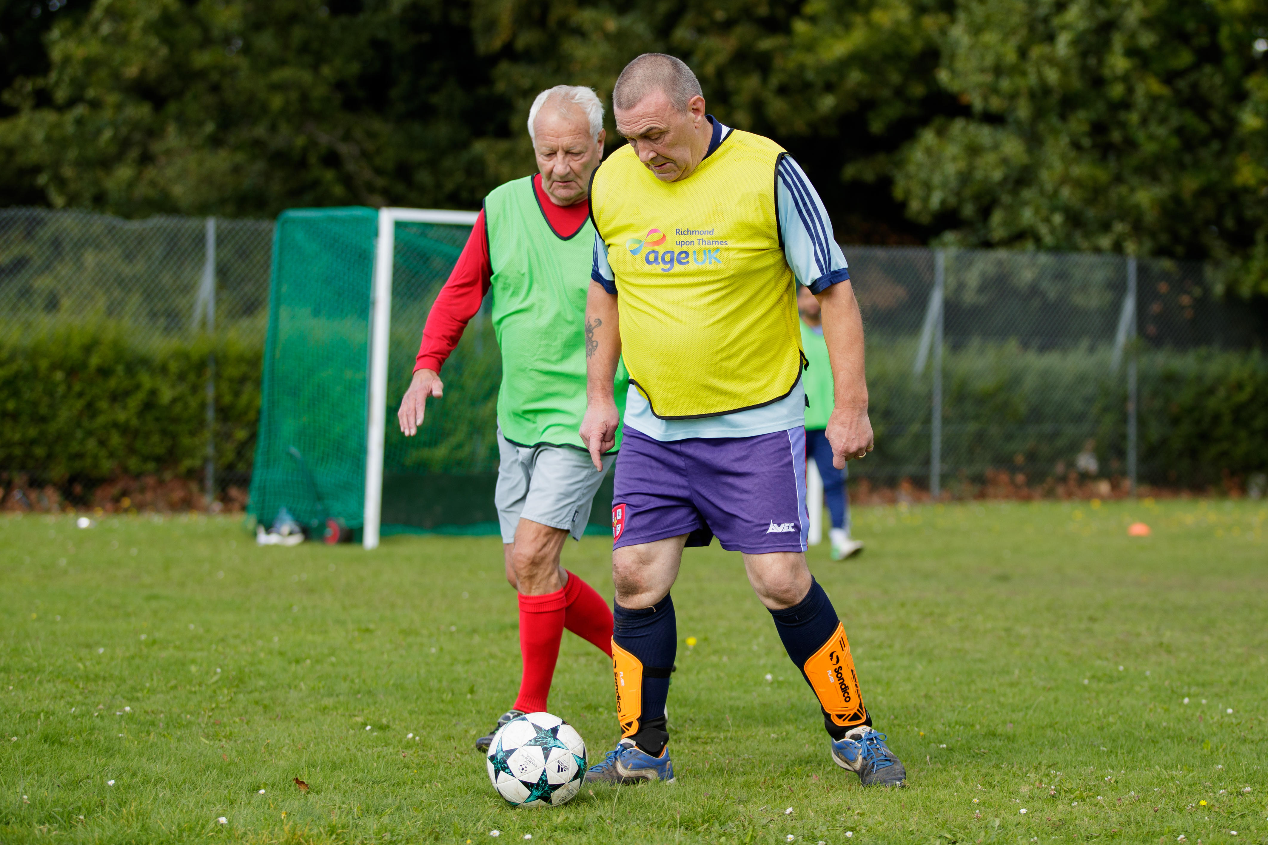 Men during a Senior walking football training session
