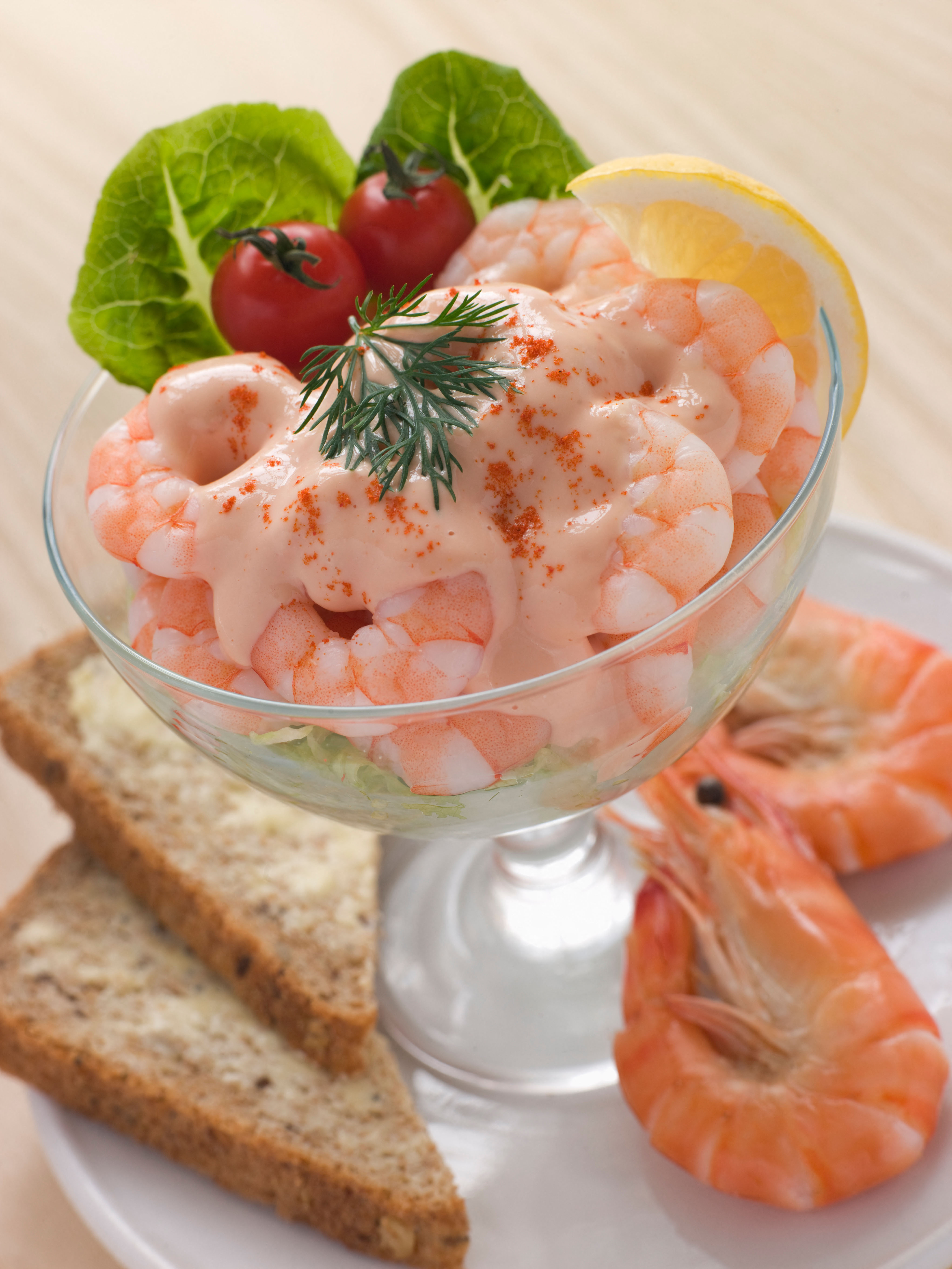 Prawn cocktail in a glass with brown bread