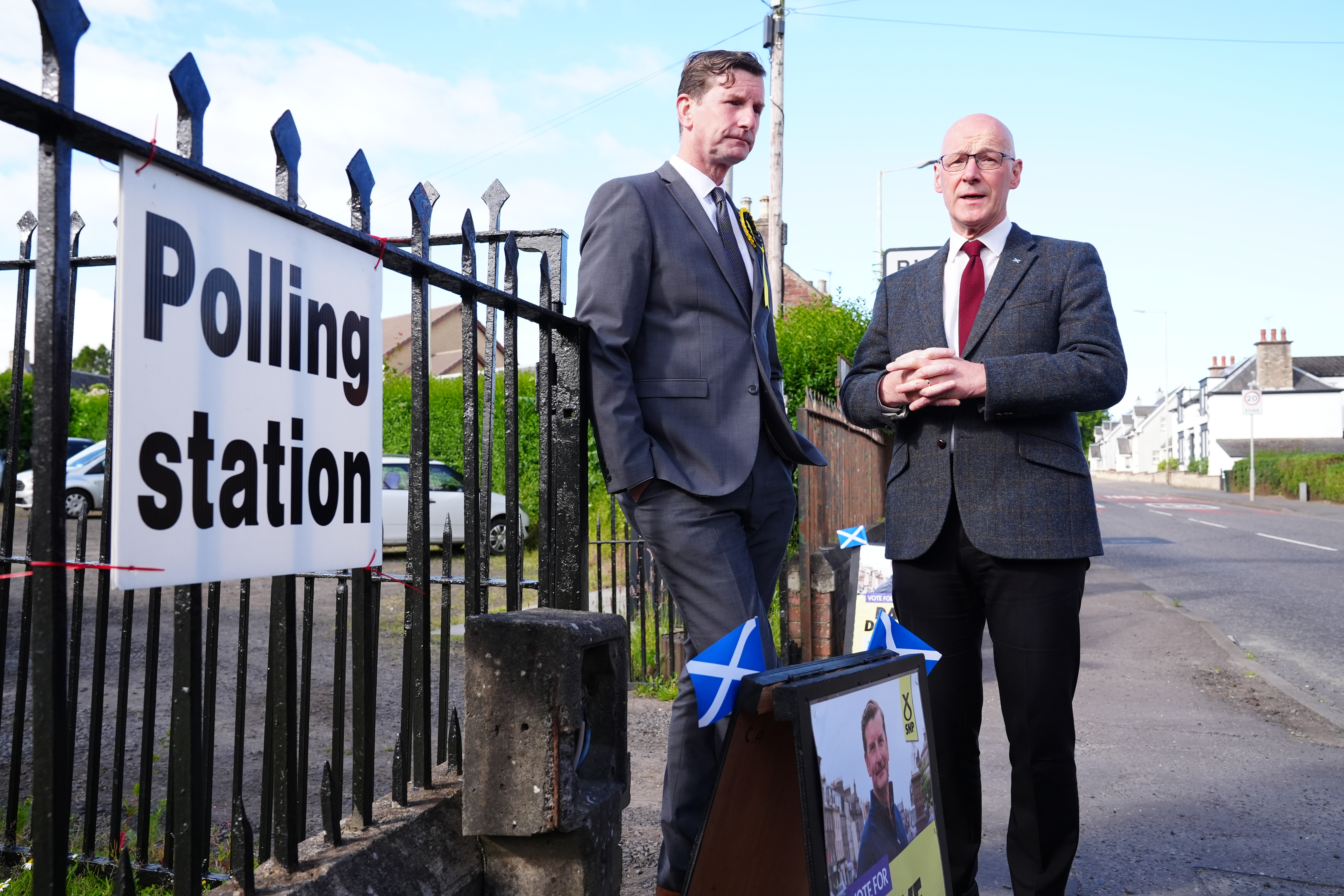 Dave Doogan and John Swinney standing outside a polling station