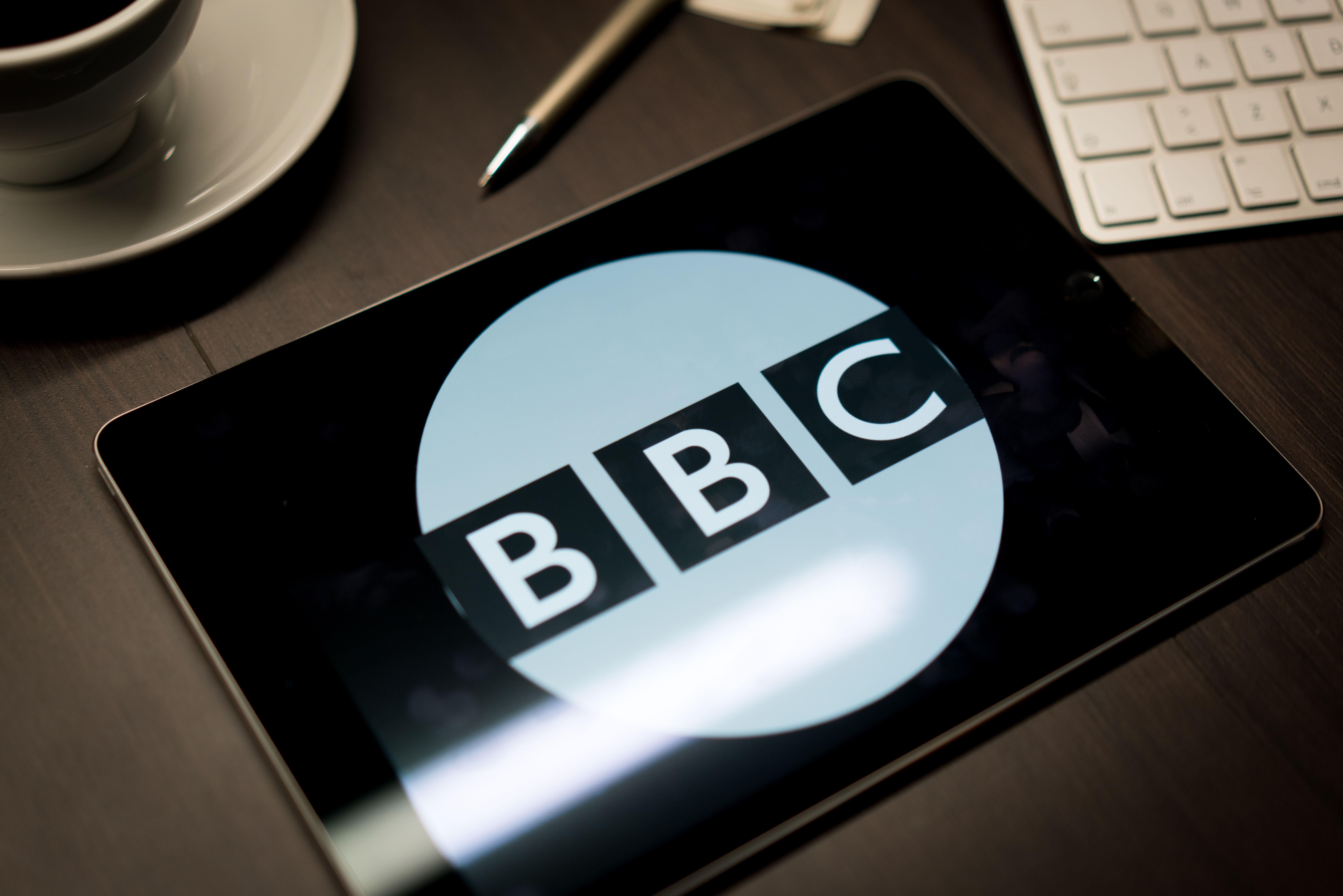 Logo of BBC on the iPad Air2 on office desk