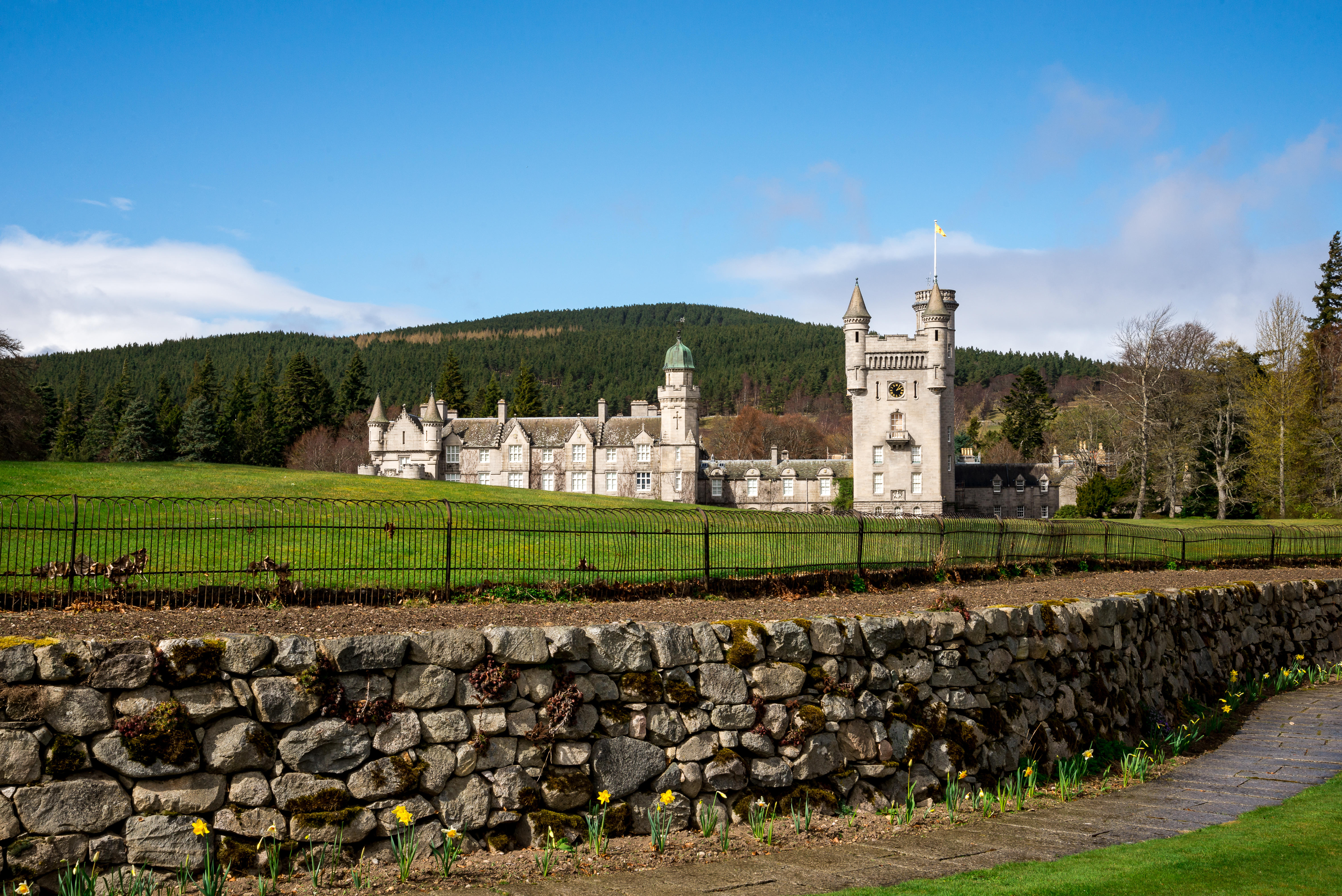 A view of Balmoral Castle, under blue skies