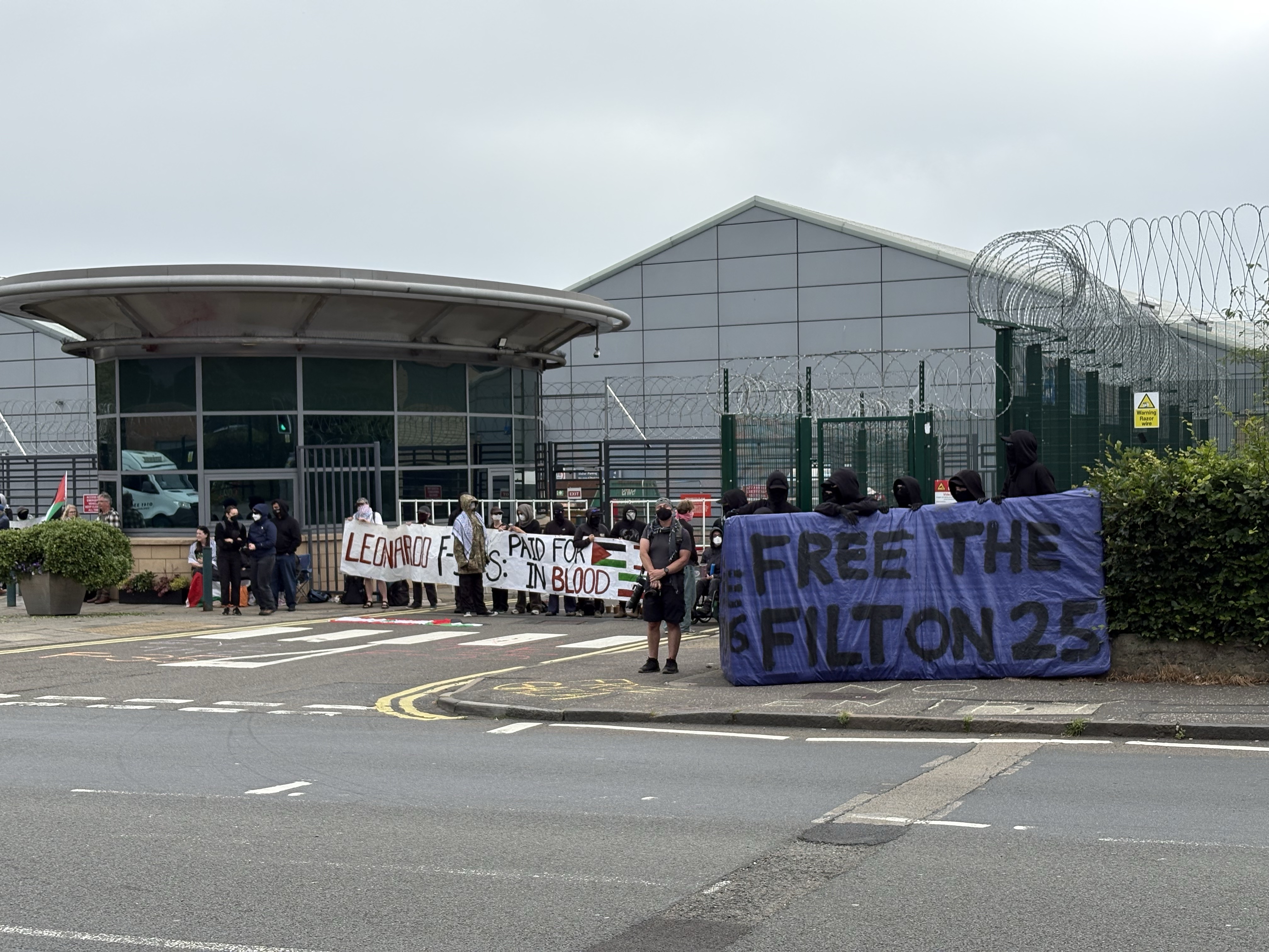 Pro-Palestinian protesters outside a factory