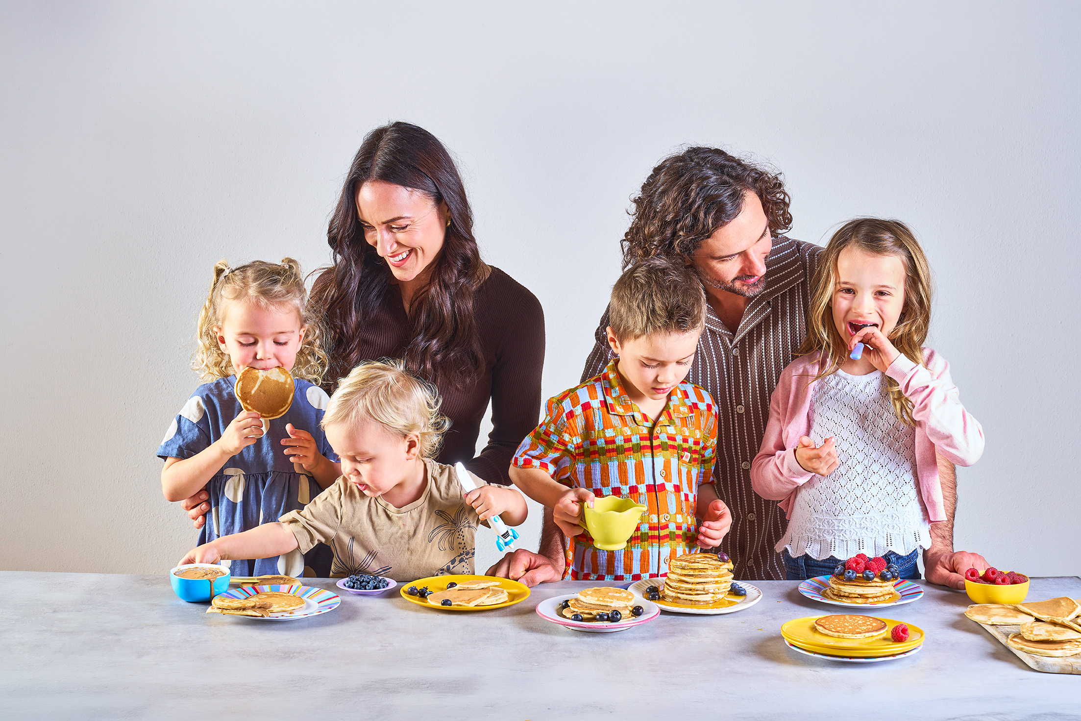 Rosie Wicks (back left), Joe Wicks (back right) and their four children (front L-R): Leni, Dusty, Marley and Indie