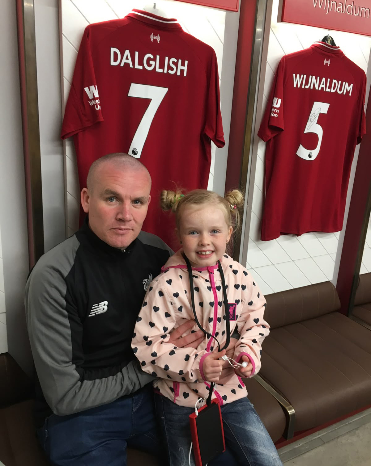 Damien Coakley with his daughter Mia during a tour of Liverpool Football Club