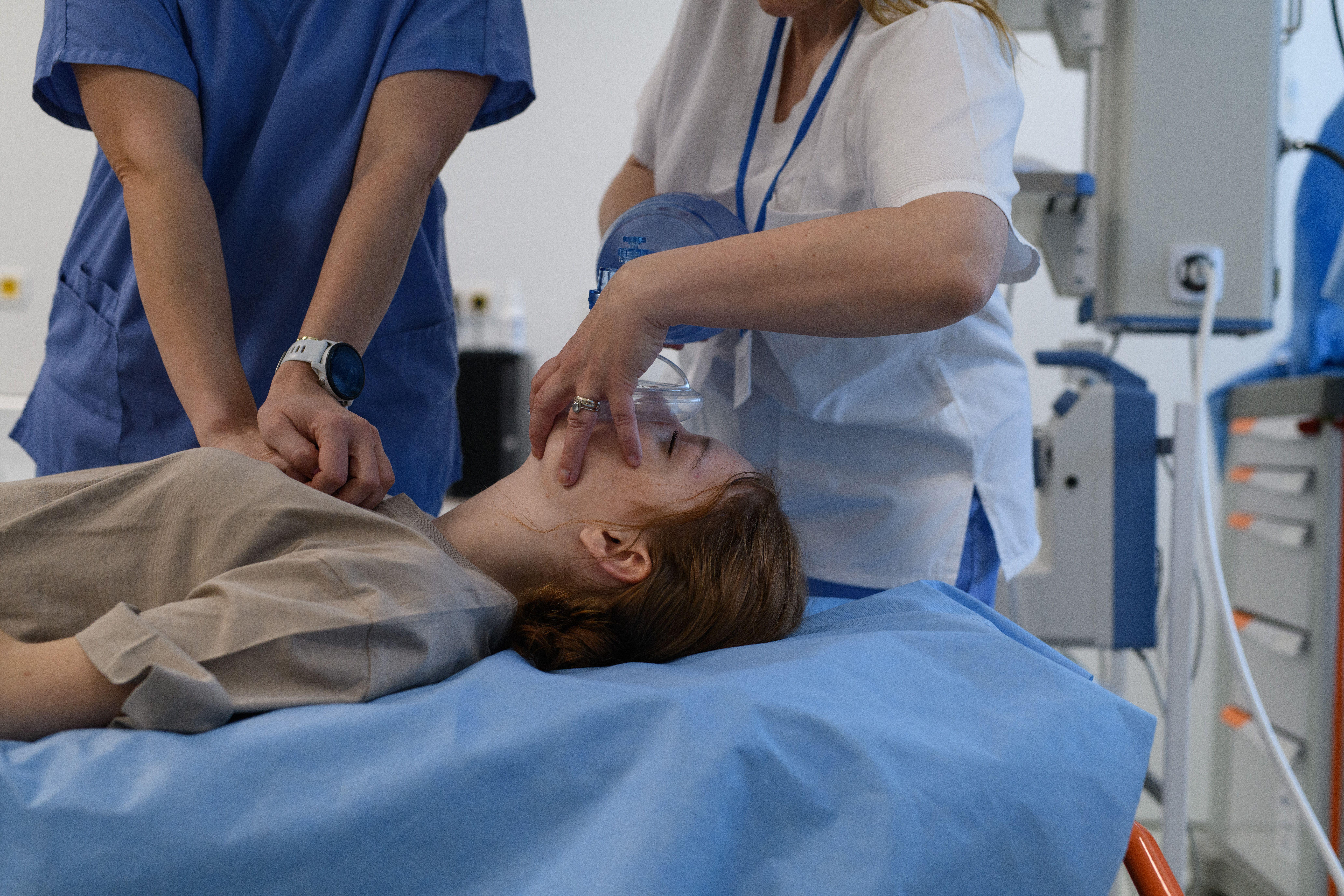 Medics performing CPR on a patient