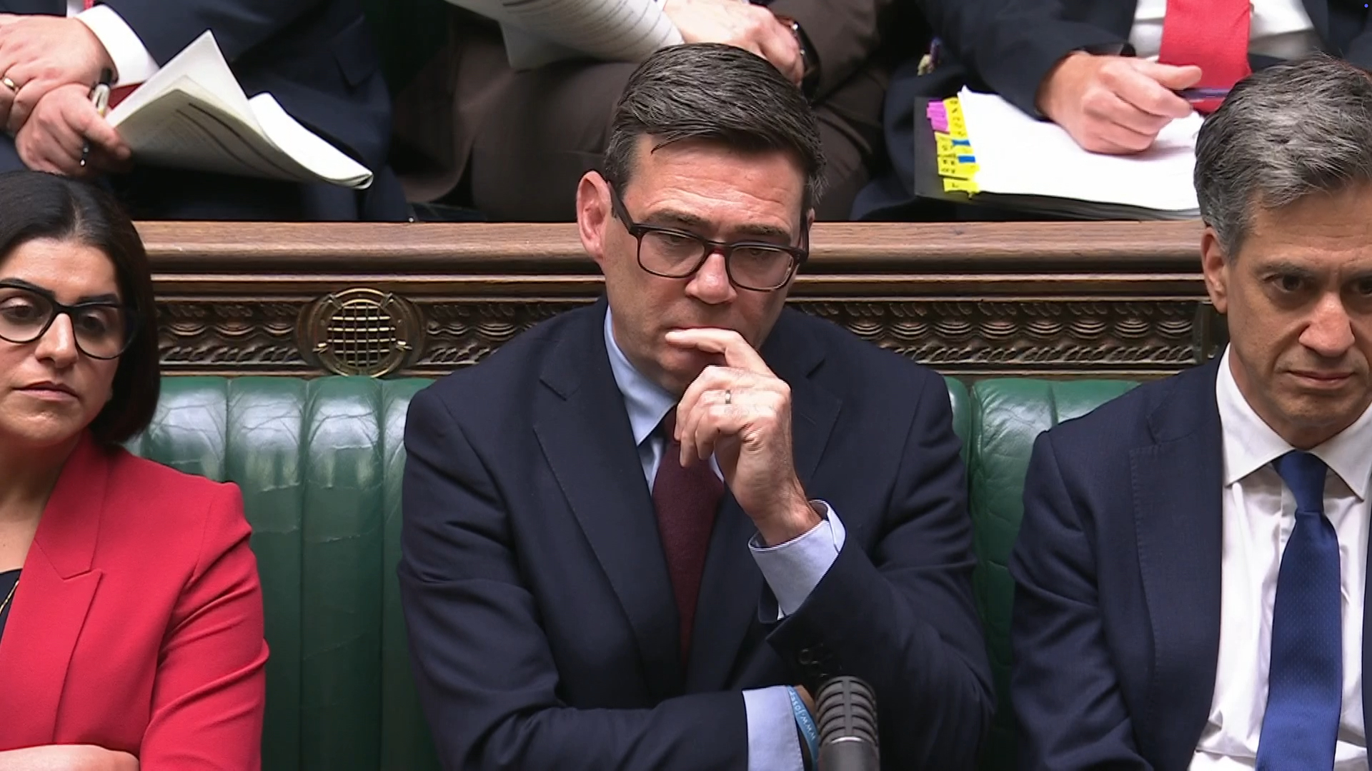 Andy Burnham seated in the House of Commons
