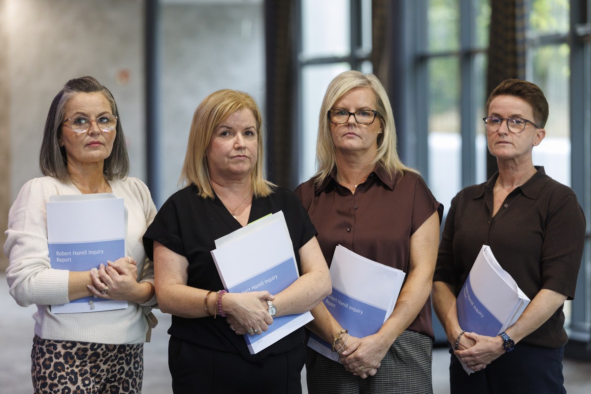 The family of Robert Hamill with the inquiry report