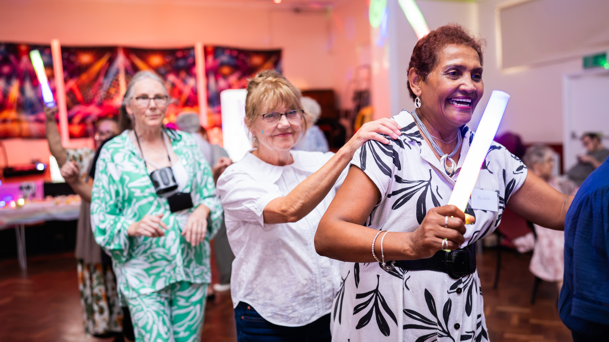Tony Christie fans dancing during the launch event