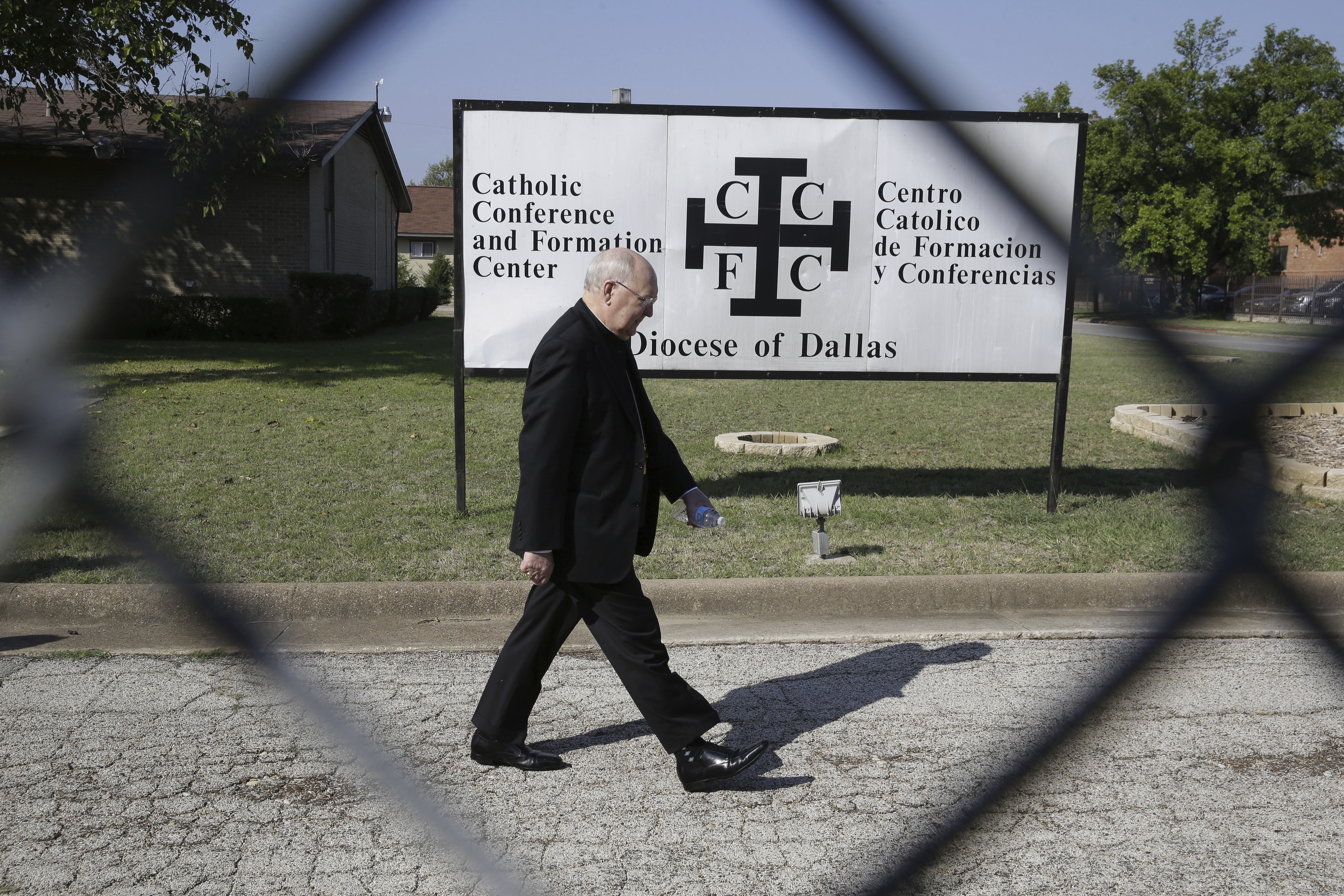 Cardinal Kevin Farrell walks outside the Diocese of Dallas Catholic Conference and Formation Centre in 2014