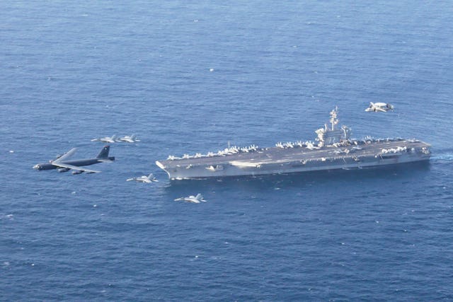 The USS Abraham Lincoln carrier and a US Air Force B-52H Stratofortress, conduct joint exercises in the US Central Command area of responsibility in Arabian Sea