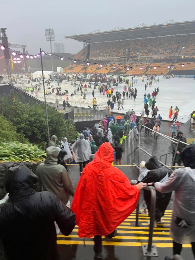 Fans leave Mt Smart Stadium in Auckland where about 40,000 people were expected to attend an Elton John concert