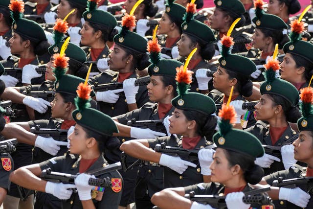 Soldiers march during the ceremony in Colombo