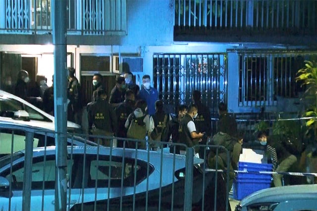 Police search a house
