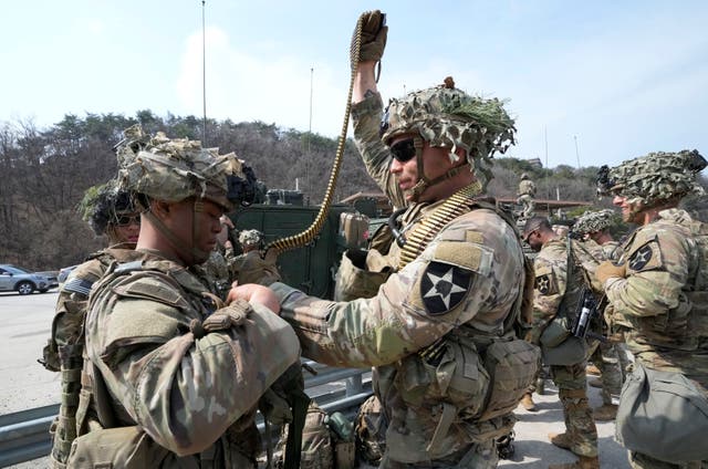US soldiers prepare for a combined live-fire exercise