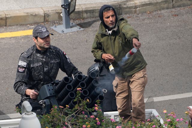 Lebanese soldiers fire tear gas at protesters in Beirut