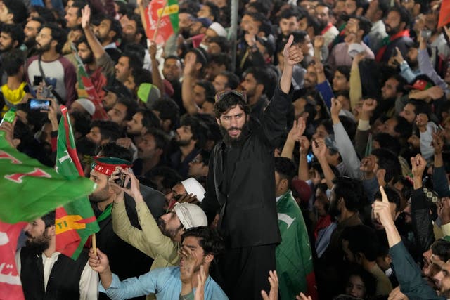 Supporters of Mr Khan's attend the rally