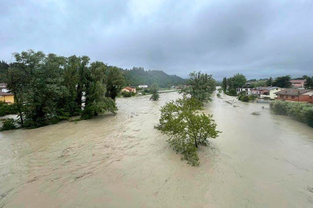 The overflowing Savio river in Cesena, central Italy, on Wednesday