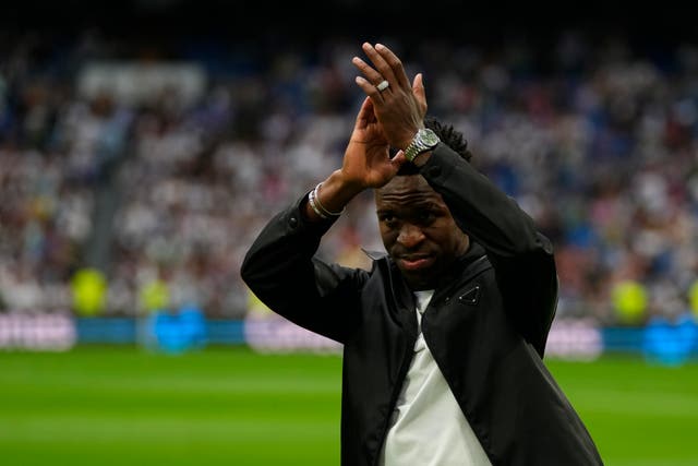 Vinicius Junior applauds Real Madrid fans at the Bernabeu on Wednesday evening