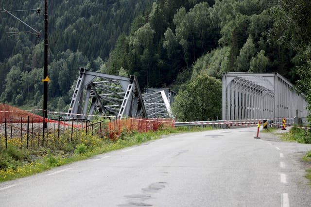 A section of a railway bridge collapsed into the water over the Laagen River in Ringebu, Norway