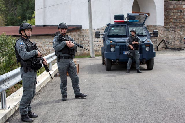 Kosovo police officers secure the area outside the Banjska monastery