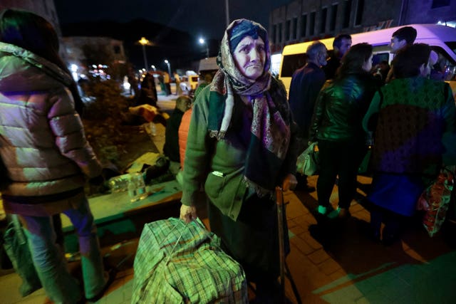 An ethnic Armenian woman from Nagorno-Karabakh arriving to Armenia’s Goris in Syunik region