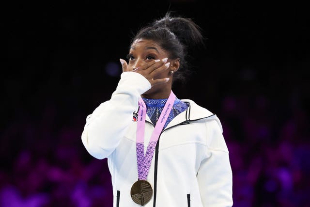 Simone Biles cries on the podium