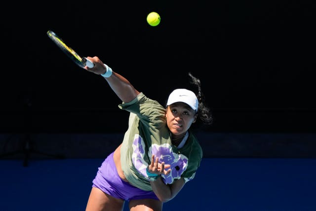 Naomi Osaka serves during a practice session in Melbourne