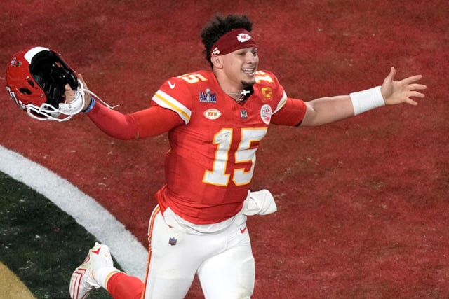 Kansas City Chiefs quarterback Patrick Mahomes (15) celebrates their win in overtime