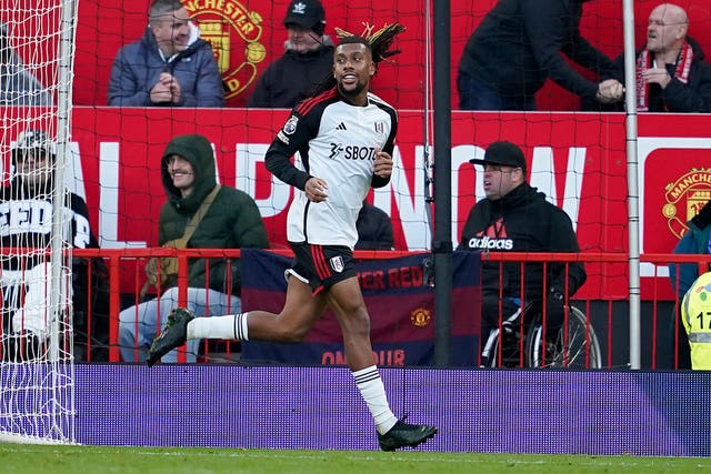 Alex Iwobi celebrates his winner against Man Utd