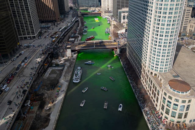 The Chicago River is dyed green for St Patrick’s Day celebrations in the US
