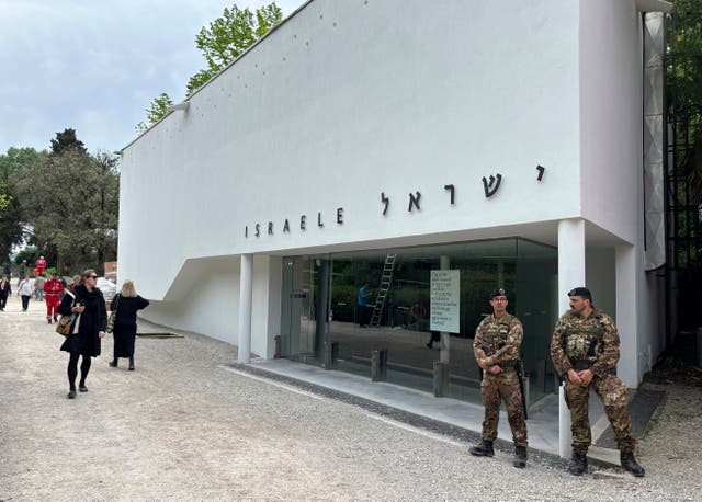 Italian soldiers patrol the Israeli national pavilion at the Biennale contemporary art fair in Venice, Italy