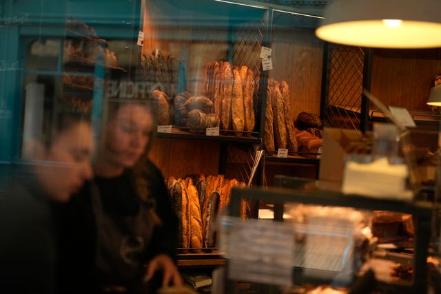 Customers in the Utopie bakery in Paris