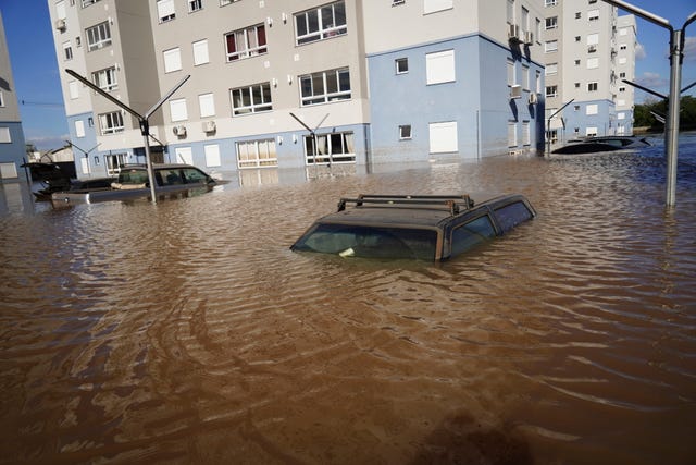Cars are submerged in floodwater after heavy rain in Canoas, Rio Grande do Sul state, Brazil 