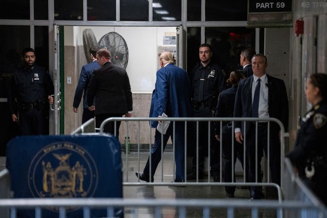 Former US president Donald Trump exits the courtroom during a break at Manhattan criminal Court in New York 