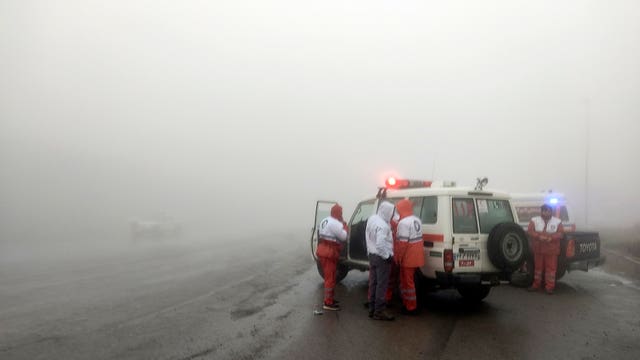 Rescue teams near the site of the incident of the helicopter carrying Iranian President Ebrahim Raisi in Varzaghan in north-western Iran
