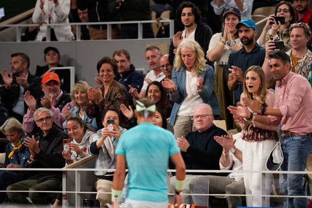 Spectators applaud Rafael Nadal