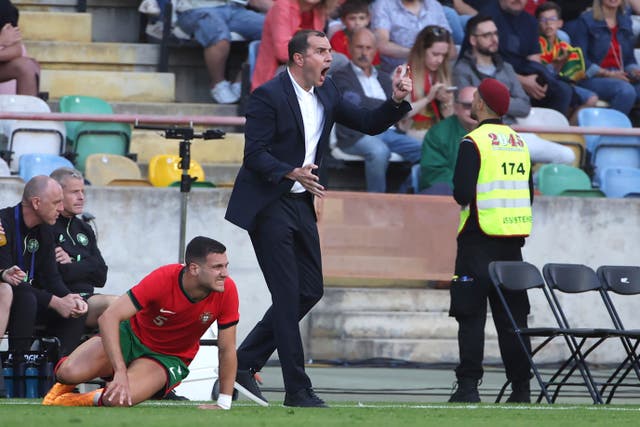 Ireland boss John O'Shea shouts instructions to his players on the touchline