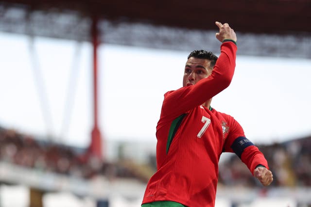 Cristiano Ronaldo produces his trademark celebration after scoring for Portugal