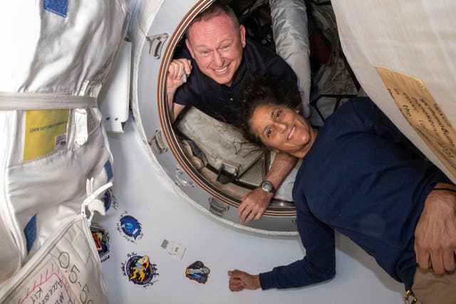 Boeing astronauts Butch Wilmore and Suni Williams in the Harmony module of the International Space Station