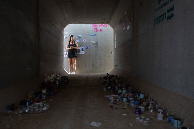 A visitor looks at the Hamas attack site