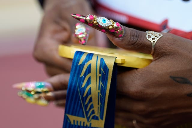Sha’Carri Richardson holds her goal medal after winning the 100 metres at the US Olympic trials
