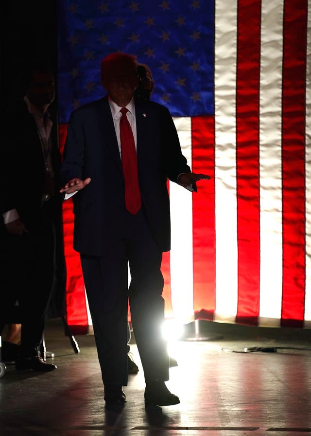 Donald Trump arrives to speak at a campaign rally at Temple University in Philadelphia
