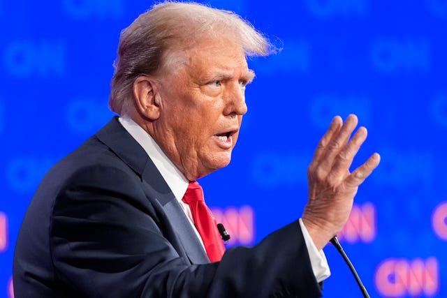 Republican presidential candidate former president Donald Trump speaks during a presidential debate with US President Joe Biden
